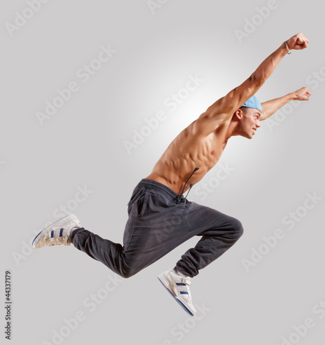 Photo: young man dancing hip hop young man dancing hip hop