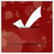 White tick applique on red background