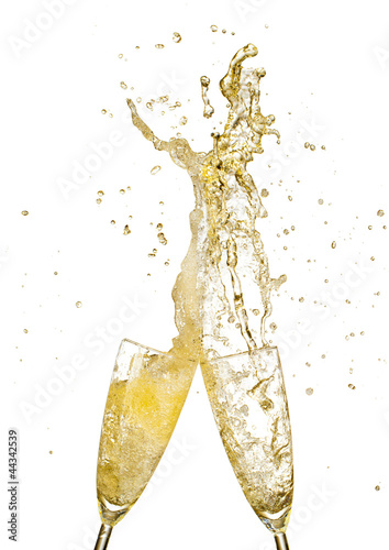 Photo: Splashing champagne out of glasses Splashing champagne out of glasses