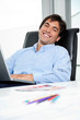 Foto: Interior Designer Using Laptop Interior Designer Using Laptop