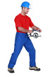 A manual worker with a circular saw.
