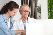 Women sitting at a laptop