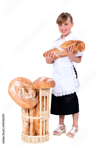 Photo: Little girl pretending to be baker Little girl pretending to be baker