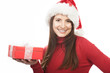 Foto: Mädchen mit Weihnachtsgeschenken Mädchen mit Weihnachtsgeschenken
