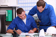 Laborers sharing a joke in the office