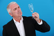 Man looking at glass