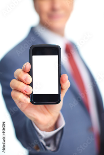 Foto: Businessman with a phone. Businessman with a phone.
