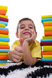 Photo: schoolboy showing thumb up schoolboy showing thumb up
