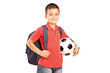 Foto: A child with backpack holding a soccer ball A child with backpack holding a soccer ball