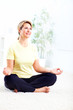 Senior woman doing yoga.