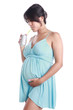 Foto: Young pregnant woman and drink in a can Young pregnant woman and drink in a can
