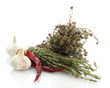 dried herbs in mortar and vegetables, isolatrd on white