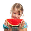 Kind beim Melone essen