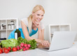 Cheerful young woman cooking