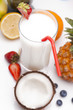 Exotic alcohol drinks set with fruits