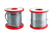 Two different size soldering tin spools