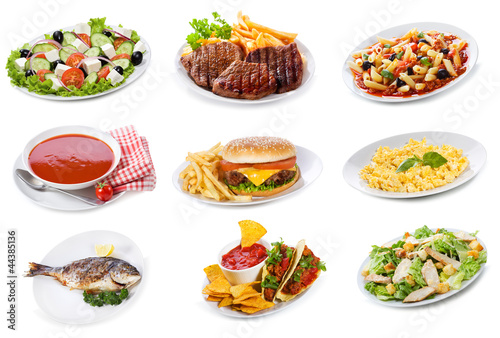 Photo: set with plates of various food products set with plates of various food products