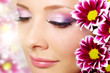 Beutiful girl face with chrysanthemum