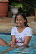 Foto: Junges Mädchen im Pool Junges Mädchen im Pool