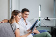 Foto: Couple Reading Magazine Couple Reading Magazine