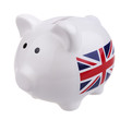 Photo: White piggy bank with union jack flag, isolated on white. White piggy bank with union jack flag, isolated on white.