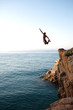 cliff jumping in the sea