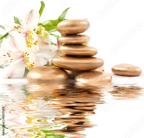 Photo: Golden spa stone and lily Golden spa stone and lily