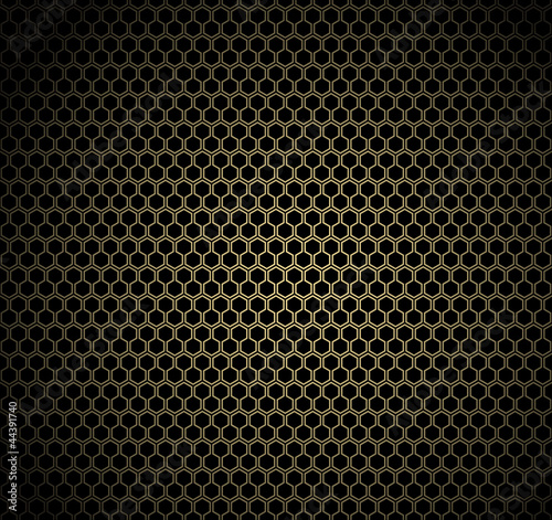 Vector: Gold honeycomb on black background Gold honeycomb on black background