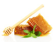 sweet honeycombs with mint and drizzler, isolated on white