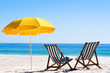 Beach chairs on sand