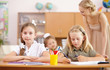 Photo: Little girl at school class Little girl at school class