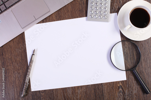 Photo: Business papers and a cup of coffee Business papers and a cup of coffee
