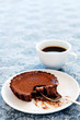 Half eaten chocolate tart dessert