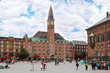 Tourists visit City Hall Square