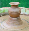 an earthen jar on the circle