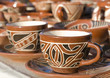 Glazed ceramics ukrainian cup are for sale at an outdoor market