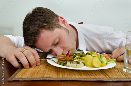 Photo: Drunk man sleeping in his dinner plate Drunk man sleeping in his dinner plate