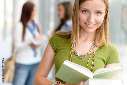 Photo: High school teenage student female read book High school teenage student female read book
