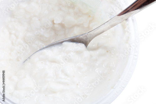 Photo: spoon in tub of cottage cheese spoon in tub of cottage cheese