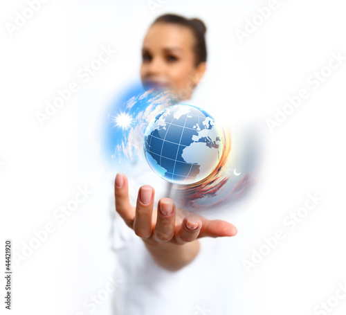 Photo: Human hand holding our planet earth Human hand holding our planet earth