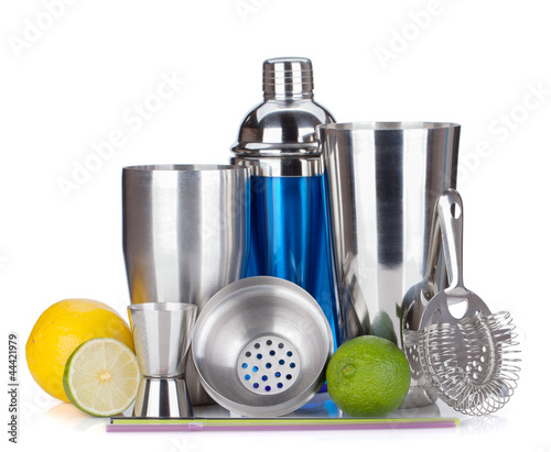 Photo: Cocktail shaker, strainer, measuring cup, drinking straws and ci Cocktail shaker, strainer, measuring cup, drinking straws and ci