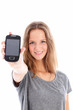 Pretty friendly smiling teenager holding up a mobile phone