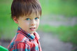 Close-up portrait of cheerful little boy
