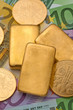 Geldanlage in echtem Gold als Goldbarren und Goldm