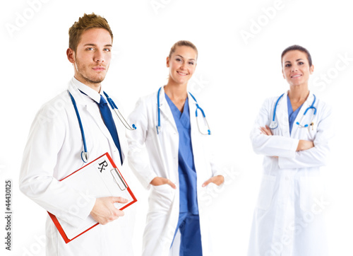 Photo: Doctor in front of his medical team Doctor in front of his medical team