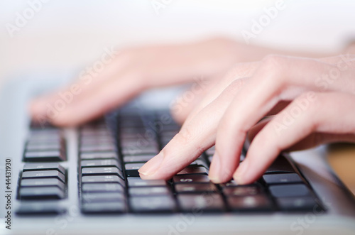 Photo: Hands typing on the keyboard Hands typing on the keyboard