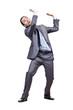 Young businessman pushing invisible obstacles