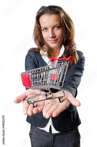 Photo: Attractive businesswoman with shopping cart Attractive businesswoman with shopping cart