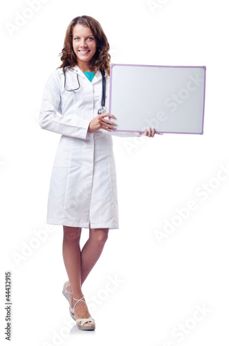Photo: Woman doctor with blank board Woman doctor with blank board