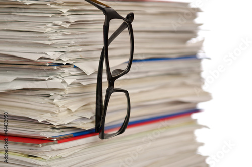 Photo: Pile of papers on white Pile of papers on white